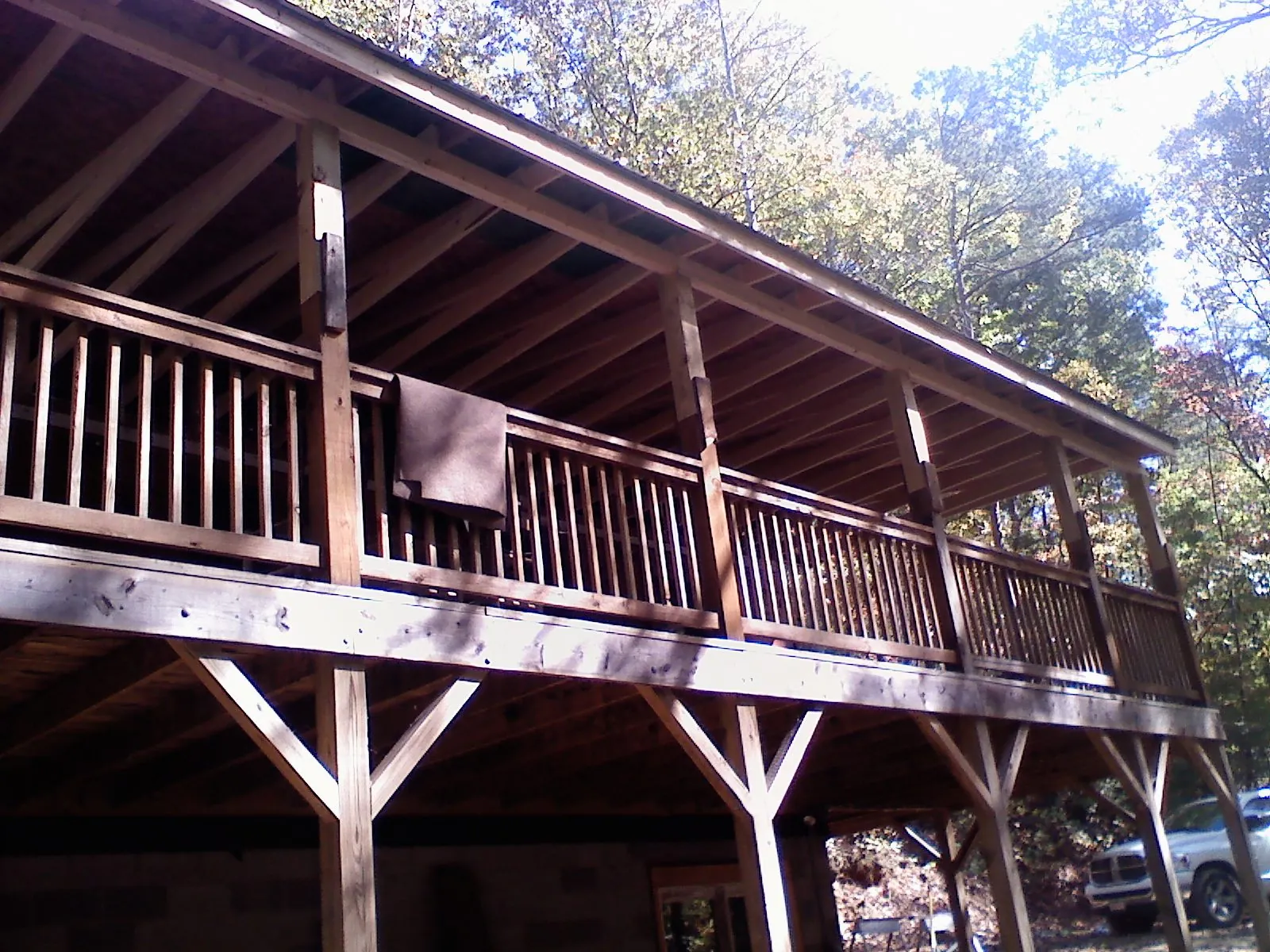 Timber framing under a new elevated porch and deck — Roof Leak Repair in Parachute by Roofing Brothers